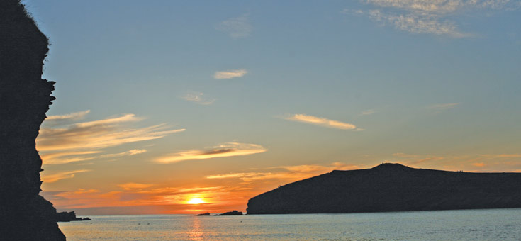 photo of sunset at Porth Beach