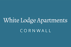 white lodge apartments logo