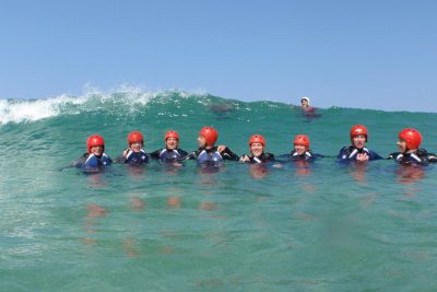 coasteering group in sea