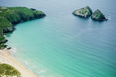 Clear green and blue sea at Holywell Bay