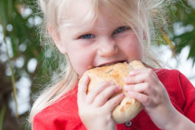 girl eating pasty