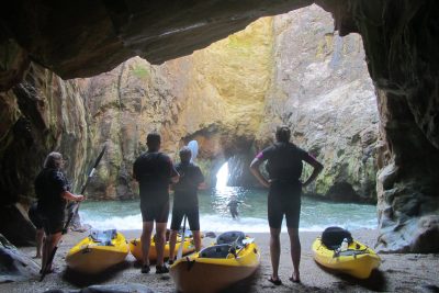 kayakers in cave