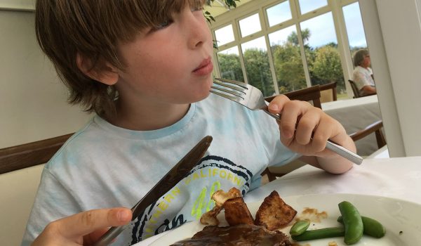 boy eating roast