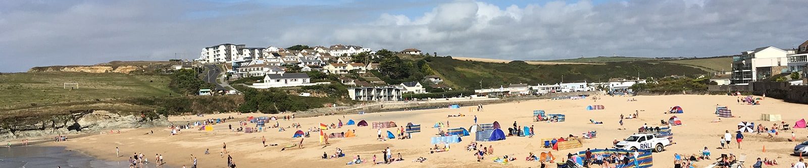 busy Porth beach in summer