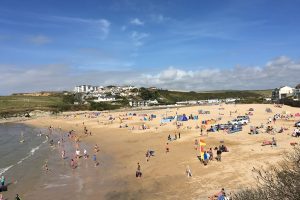 busy Porth beach in summer