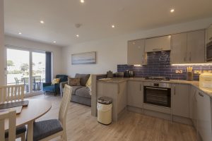 view of kitchen and lounge in 1-bedroom villa