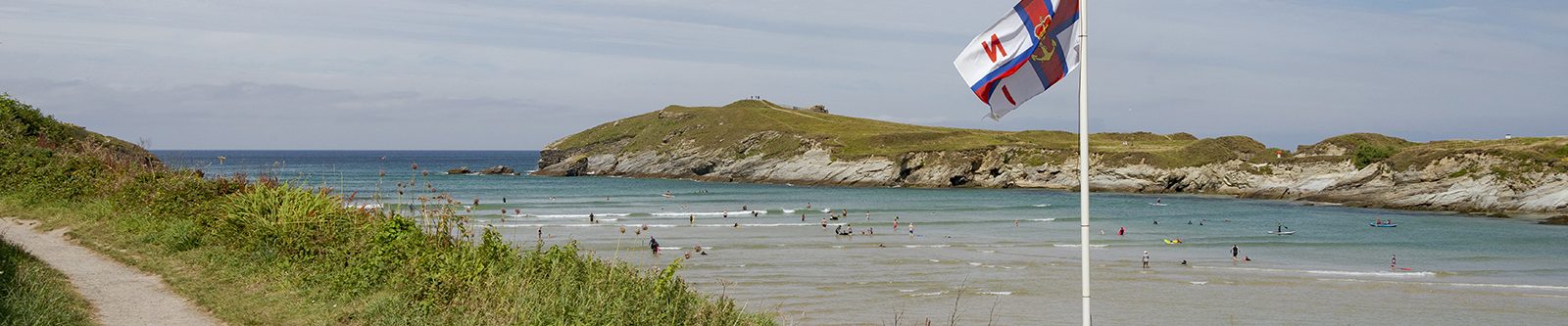 RNLI flag flying over Porth Beach