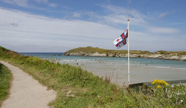 RNLI flag flying over Porth Beach