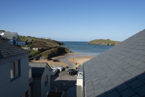 View of the beach from cottage living room balcony