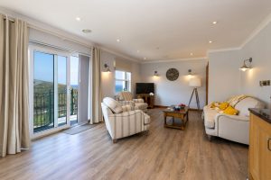 Penthouse - living room with balcony