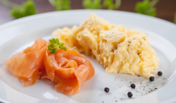 Plate of smoked salmon and creamy scrambled eggs
