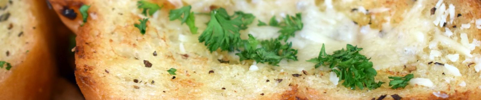 close up of cheesy garlic bread