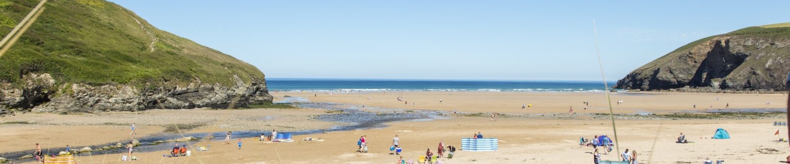 Sunbathers on Mawgan Porth Beach