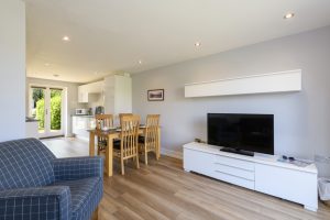 Living room, dining room through to kitchen