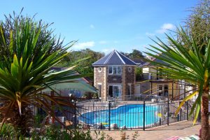 Outdoor heated swimming pool at Porth Veor Manor